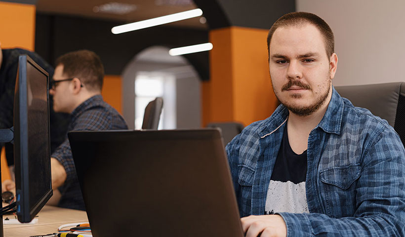 a tech guy explaining software development success stories